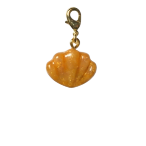 Charms concha dorada